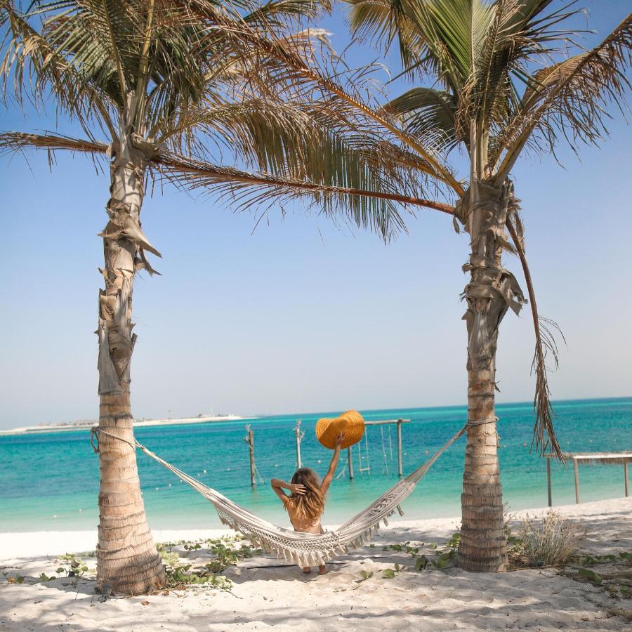 努莱岛度假村 阿布扎比 外观 照片 Hammock on the beach